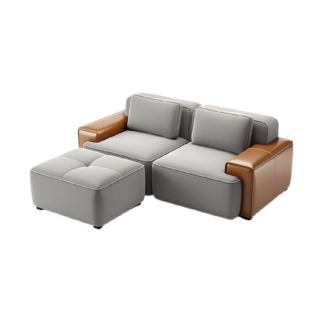 Moderne hoekbank met leren accenten en ottoman